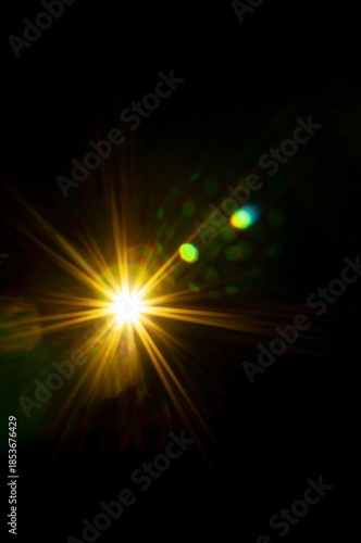 Sun flare on the black background