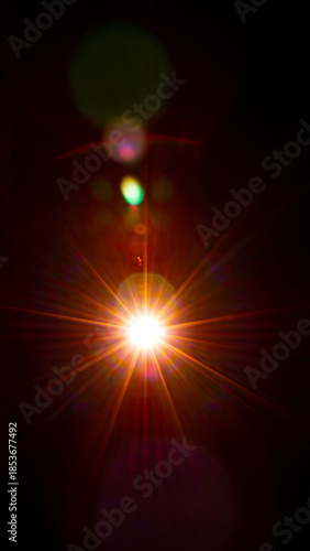 Sun flare on the black background