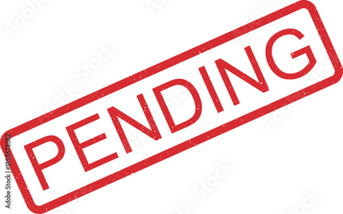 A vibrant red rectangular rubber stamp prominently features the word PENDING on a crisp white surface