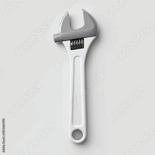 Adjustable wrench tool with white handle on a clean light