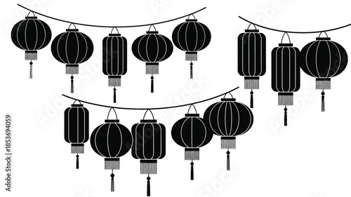 Black paper lanterns strung on a line a decorative festive arrangement