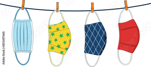 Colorful Reusable Fabric Face Masks Hanging on a Clothesline with Pins for Drying, Representing Hygiene, Safety, Virus Protection, and Healthcare