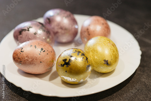 Wallpaper Mural Easter eggs on a white plate, the bright holiday of Easter Torontodigital.ca