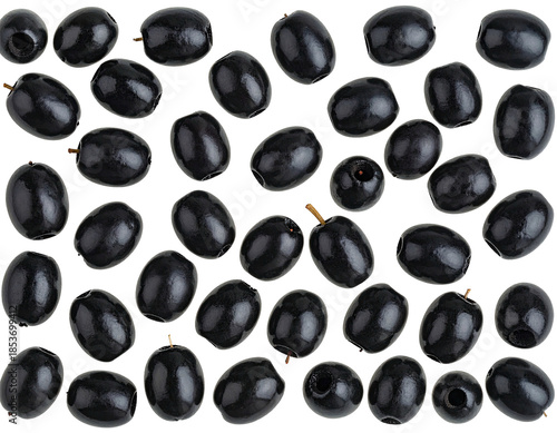 A scattering of black, shiny olives on a dark, unknown backdrop