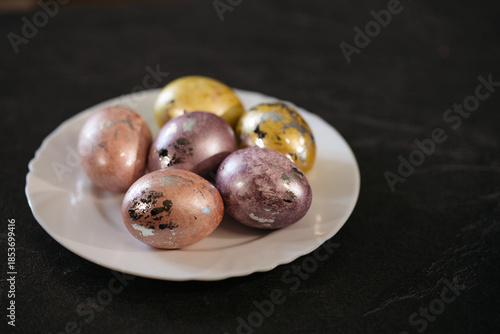 Wallpaper Mural Easter eggs on a white plate, the bright holiday of Easter Torontodigital.ca