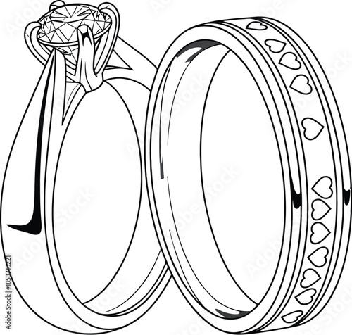 Pair of shiny silver wedding and engagement rings with diamond and heart engravings isolated on white