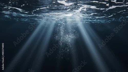 A slow, deep dive below a dark water surface, showing distorted light patterns and volumetric rays reflecting across the rippling abstract ceiling meditation, liquid movement, ocean floor
