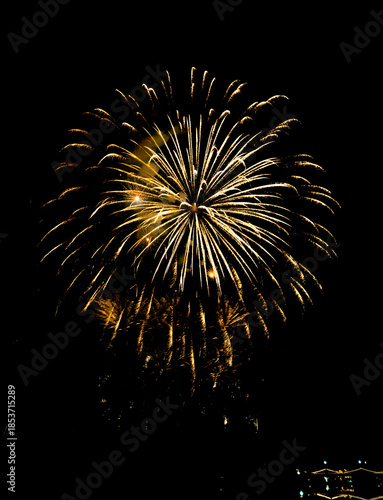 Colorful fireworks exploding in the night sky, symbolizing celebration, festival opening ceremony, New Year celebration, success, joy, and special events.