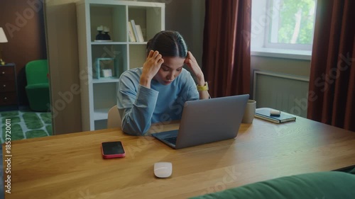 Angry asian woman work laptop home. Girl fail task. Female employee failure. Busy person use broken pc. Online computer freelance distant remote job. Worker ruined career, loss start up money. Bad day