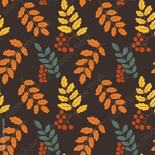 Autumn seamless pattern with rowan berry branch and leaf in hand drawn style on dark background. Image represents fall nature concept and seasonal botanical decoration
