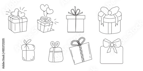 Collection of elegantly wrapped gifts with bows and ribbons