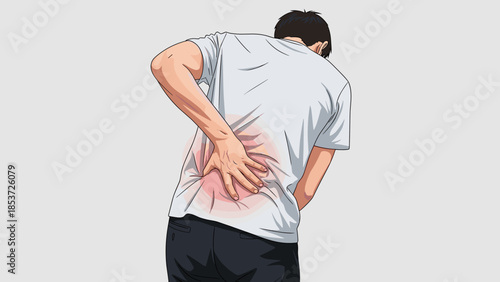 Man experiencing kidney pain while holding lower back in discomfort  