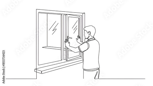Man Cleaning Window with Squeegee in Modern Home Interior