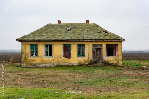 Old abandoned house in a field