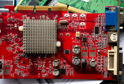 Foto Red printed circuit board with heatsink and electronic components