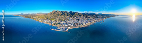 Quadro su tela Luxury Living at Dawn: Cinematic 4K Aerial of Marbella’s Golden Mile, Featuring