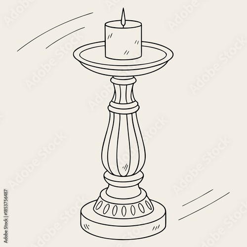 Elegant candle holder with lit candle