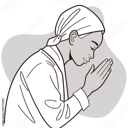 Person in prayerful pose