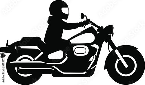 A silhouette of a motorcyclist riding a classic style motorbike