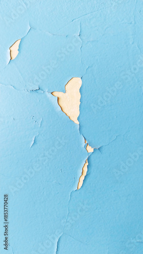 Old room wallpaper. residential building. Cracked blue paint on wall. Cleaning. Peeling off loose paint background. House repair. Housing service. Plaster. Damaged. terrible condition. conservation.