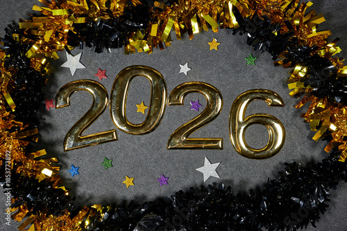 Golden 2026 Numerals With Confetti and Tinsel Create Festive New Year Display