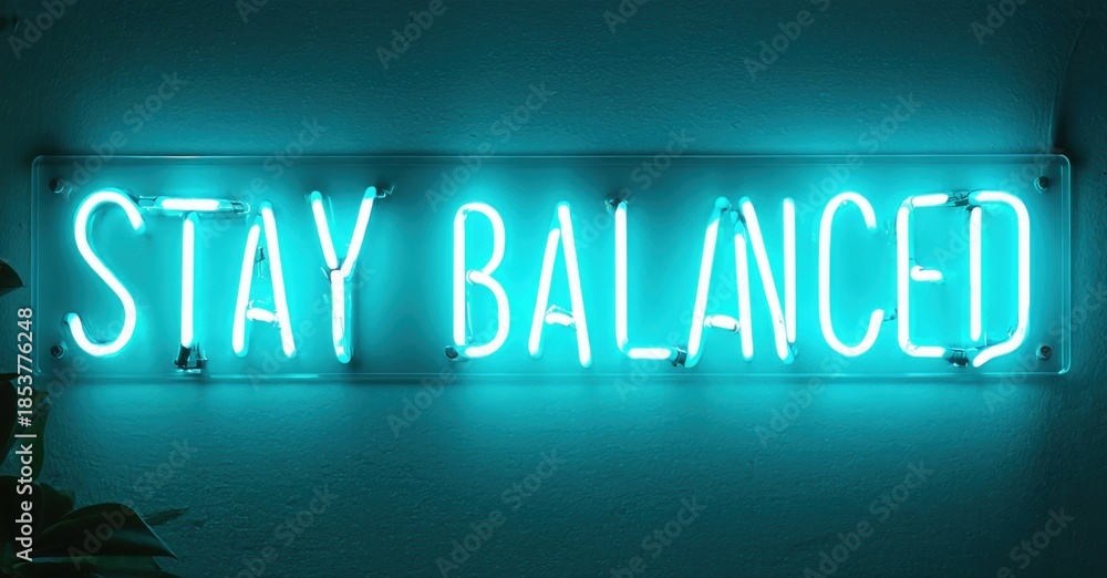 Fototapeta premium Bright neon sign displays positive message. Turquoise glow illuminates dark wall. Minimalist aesthetic, simple typography. Inspiring words promote wellbeing.