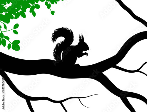 Black Squirrel Silhouette Sitting on Tree Branch with Leaves
