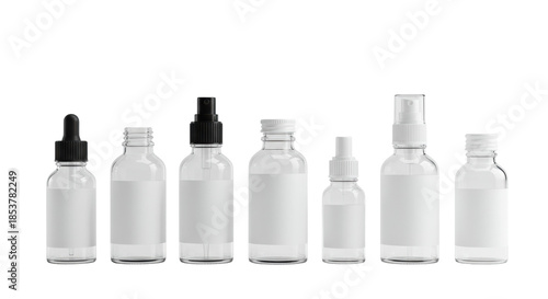 diverse transparent glass bottles, blank white labels, dropper, screw, and nozzle caps, arranged horizontally on a transparent background with copy space. professional product packaging mockup