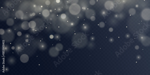 Dark abstract bokeh background with glowing light particles.
