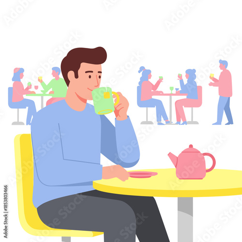 Man enjoying herbal tea while sitting at a café table  