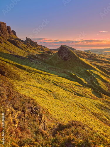 The Quiraing landform below Meall na Suiramach crest with (L-R) The Needle and The Prison rocks, Cnoc a Mhèirlich and Dùn Mòr hills. Skye-Scotland-164
