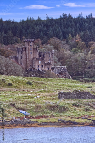 The Caisteal Dhùn Bheagain building and estate, seat of Clan MacLeod, on the Loch Dunvegan east side, seen from the local road. Skye-Scotland-147