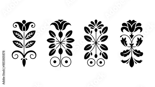 Black floral ornamental designs with symmetrical patterns