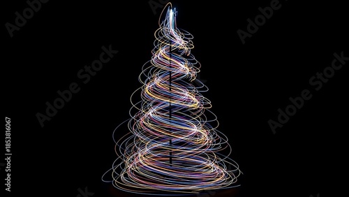 Vibrant light trails form a festive Christmas tree shape