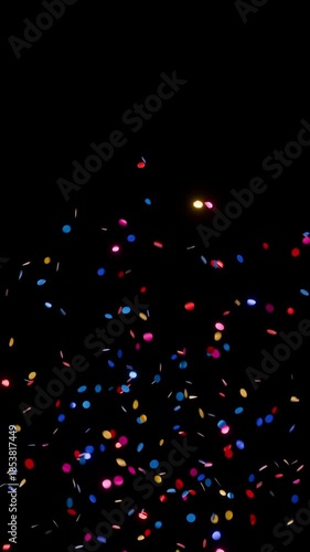 Colorful circular confetti explosions from both sides overlay on green screen and alpha channel