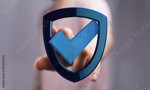 Hand holding a blue shield ...