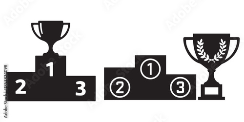 Trophy cups on winner podium with ranking numbers