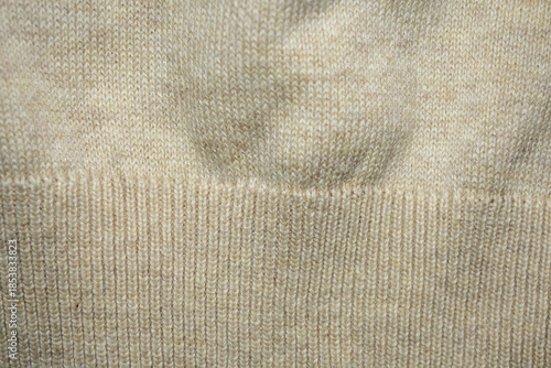Textura o fondo de tejido de lana de jersey blanco o beige. 