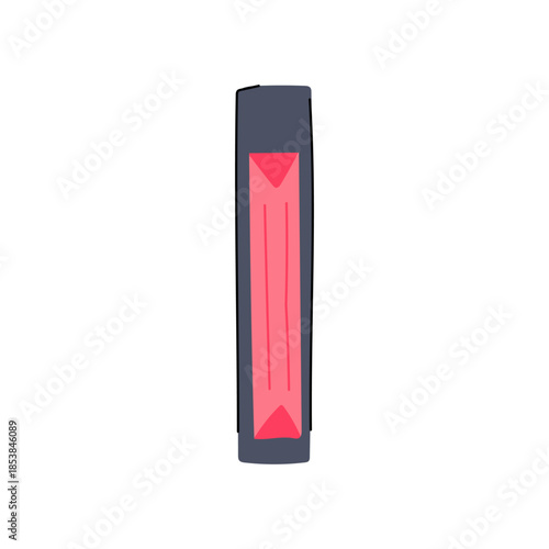 Vhs tape cassette standing vertically, displaying a retro red label, representing obsolete analog media and symbolizing nostalgia for 80s and 90s entertainment