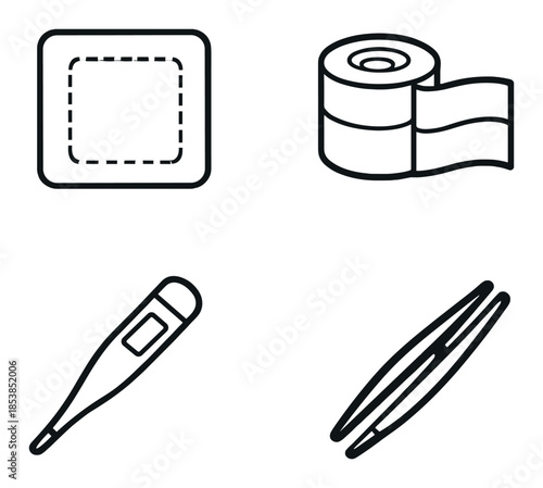 Essential first aid items: bandage, medical tape, thermometer, tweezers on gray background