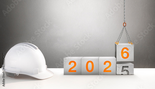 The year 2026 in the concrete cube. The construction crane is lifting the new number 6 to replace the old number 5.