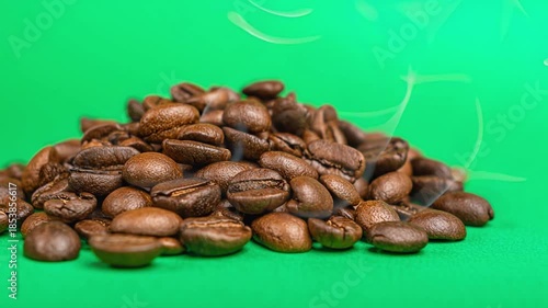 Aromatic Coffee Beans: A close-up view of roasted coffee beans, emitting an enticing aroma against a vibrant backdrop, perfectly embodying the essence of a morning ritual.