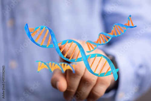 A person holding a 3D DNA m...