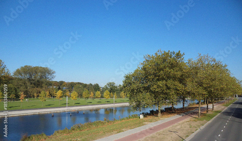 River in the park. Minimalist view. Nature backdrop. Beautiful natural flyer, card design. Nature Template for presentation or product 