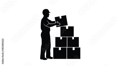 Silhouette of a construction worker wearing a hard hat carefully stacking boxes in a warehouse setting