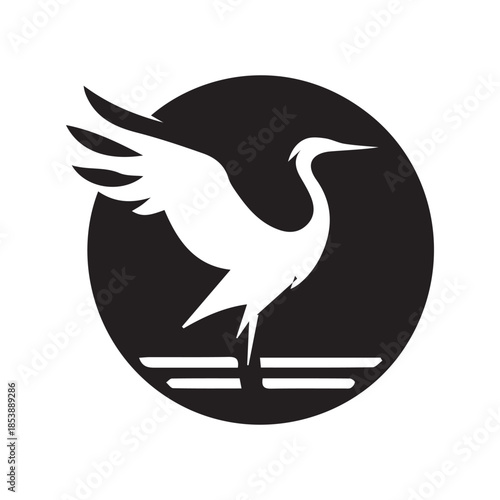 Stylized white crane bird with spread wings in black circle