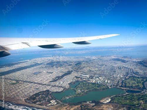 Photography Take off from San Francisco airport with a view over the city from above showing