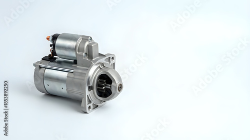 New silver automotive starter motor component isolated on a clean white background
