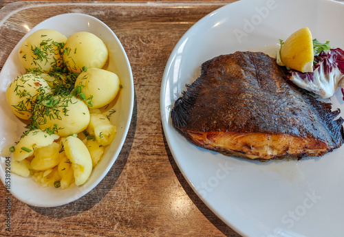 Wallpaper Mural Grilled halibut served with young potatoes, lemon, and greens Torontodigital.ca
