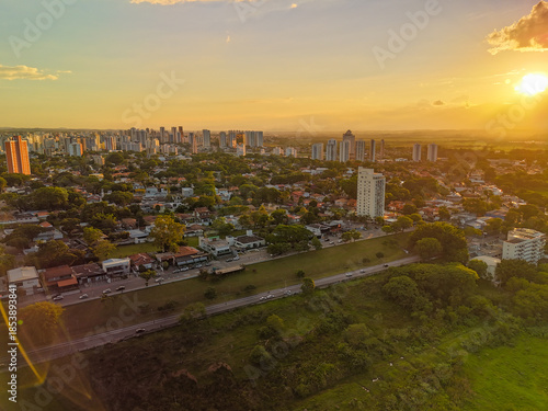 aerial view of a sunset near Banhado in Sao Jose dos Campos with astonishing colors and the city in the background.
